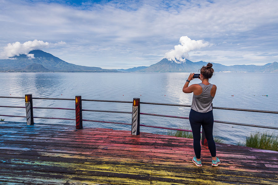 A tourist takes a photo at Lake Atitlan, an unmissable sight in Guatemala